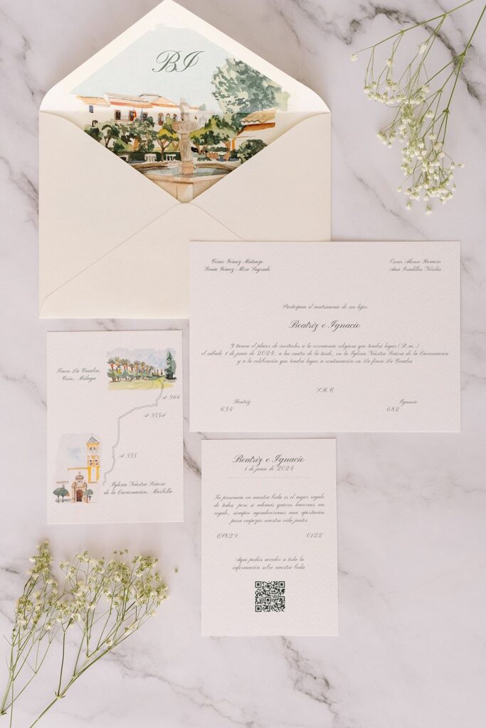 Invitación de boda personalizada con diseño ilustrado y papelería artesanal